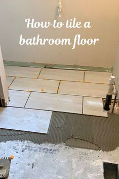 how to tile a bathroom floor with the words how to tile a bathroom floor in white