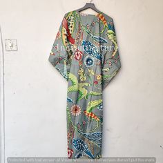 "This Beautiful Indian Cotton Caftan or can be called as Tunic is made with super fine quality cotton and designs have been crafted by Hand Prints. Measurements :- Size - Free Size Length -130 Cm /52\" Inches Bust/chest size - 120 CM/ 48\" Inches Fabric - 100% Cotton Pattern - Floral Kaftan has Adjustable Drawstring Waist to loose or tight , Kaftan has V Shape Neck Which is 8\" Inches Deep. Kaftan Is Multi-purposeand can be worn as a cover up at the Beach ,Loumge wear ,sleepwear ,Pregnant Women Green Printed Kimono For Beach, Beach Green Printed Kimono, Fitted Bohemian Kaftan With Kimono Sleeves, Green Printed Beach Kimono, Fitted V-neck Kaftan For Vacation, Fitted Multicolor Kimono For Vacation, Fitted Beach Kimono With Kimono Sleeves, Fitted Bohemian Kimono For Vacation, Fitted Printed Kimono For The Beach