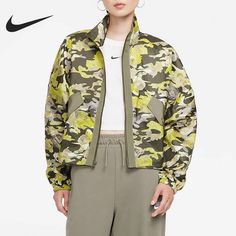 Brand New With Tags Women Floral Camo Windbreaker Size Medium Spring Camouflage Outerwear For Outdoor, Spring Camouflage Outdoor Outerwear, Spring Khaki Outdoor Track Jacket, Sporty Long Sleeve Camouflage Outerwear, Nike Casual Track Jacket For Spring, Nike Outerwear For Spring Streetwear, Nike Spring Long Sleeve Track Jacket, Trendy Green Windbreaker, Nike Long Sleeve Track Jacket For Spring