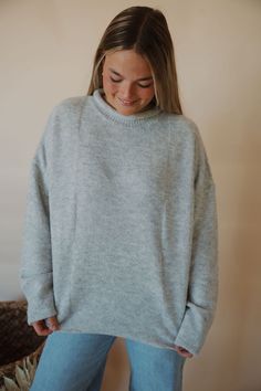 front view of model wearing the late night talking sweater in the color heather grey. model has the sweater paired with the genevive denim. Late Night Talking, Early Fall Outfit, Pattern Mixing, Mock Neck Sweater, Cozy Fashion, Sweaters Oversized, Late Night, Sweater Weather, Drop Shoulder