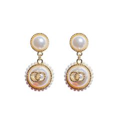 Look elegant and glamorous with these Graceful Glamour Pearl Earrings! These earrings put the “glam” in glamourous! Shine bright with these exquisite earrings and get ready to be the belle of the ball! These earrings feature pearl studs, gold detailing, small pearls circling larger pearl dangles, and a secure post backing. • Earrings measure 2" in length and 1" in width Pearl Embellished Earrings For Party, Glamorous Party Earrings With Pearl Charm, Chic Pearl Drop Clip-on Earrings For Party, Elegant Pearl Charm Clip-on Earrings, Classic Pearl Chain Earrings For Party, Chic Pearl White Earrings For Formal Occasions, Elegant Clip-on Earrings With Pearl Charm, Chic White Earrings With Pearl Chain, White Gold Plated Pearl Earrings For Party