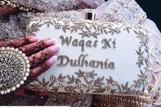 This magnificent beauty is handcrafted on a raw silk material with added personalized touch for you. Comes with a golden sling.  This piece was curated on a ivory raw silk fabric to complement someone's special day ☺️ If you like this style we can help you customize it to choice of your color and name you would like. Email us at info@clutcheeet.com with your requirements and we will make it happen for you 🤗 Gold Tussar Silk Dupatta For Reception, Wedding Dupatta With Pearl Embroidery In Raw Silk, Wedding Raw Silk Dupatta With Pearl Embroidery, Traditional Gold Dupatta With Pearl Embroidery, Designer Wedding Dupatta In Raw Silk, Wedding Dupatta With Gold Embroidery In Tissue Silk, Wedding Dupatta With Gold Embroidery On Tissue Silk, Gold Embroidered Tissue Silk Dupatta For Wedding, Gold Silk Thread Wedding Dupatta