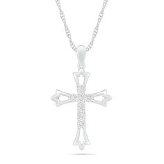 Display your faith with this elegant diamond cross pendant. Created in sterling silver, this design showcases petite diamonds - each artfully set to enhance size and sparkle - arranged in a cross shape. The open-worked flared edges gleam with floral details. Captivating with 1/20 ct. t.w. of diamonds and a bright polished shine, this pendant suspends along an 18.0-inch rope chain that secures with a spring-ring clasp. Diamond White Cross Pendant Jewelry, Diamond Cross Jewelry With Diamond Accents, Diamond White Crucifix Cross Necklace For Anniversary, Diamond White Crucifix Necklace For Anniversary, Cross Shaped Diamond Jewelry With Accents, Anniversary Diamond Cross Pendant Necklace, White Diamond Cross Pendant Necklace, Fine Jewelry Cross With Diamond Accents, Fine Jewelry Cross Shaped With Diamond Accents