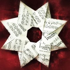 an origami star with sheet music on it