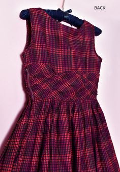 "🌸 RED PLAID SUN DRESS ------------------------------------------- Vintage cotton red & black dress from the 40's - 50's. Side metal red zipper, unlined. NO SIGNS IT WAS EVER USED. It's a small size. Unlined. Rich red & black colors.It has a slight deep red/purple on part of the design. 🌼I have LAY-A-WAY! - just ask CONDITION: Near Mint. No signs it was ever used. Still has paper tag. Hand washed in organic soap. LABEL: None SIZE: Small or XS BUST: 32\" - Fabric measures 16\" across wh Retro Plaid Dresses For Vintage Fashion, Fitted Plaid Retro Vintage Dress, Fitted Retro Plaid Vintage Dress, Fitted Retro Vintage Dress For Picnic, Retro Plaid Fitted Vintage Dress, Vintage Fitted Dress For Picnic, Red Fitted Sleeveless Vintage Dress, Retro Fit And Flare Party Dress, Red Sleeveless Vintage Dress For Party