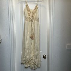 Nwt!! You Cannot Miss This Boho V-Neck Lace Up Slip Dress In Summer. Cupshe Dress Features Adjustable Straps And Smocked Design, Tassel Detail, Sleeveless, Lace Appliques, High-Low Hem And Beach Style.. It Is Perfect For A Vacation. The Maxi Dresses For Women 2024 Is White, The Perfect Sundresses For Women In Summer 2024! 50% Cotton, 50% Nylon V-neck Maxi Dress With Tassel Ties For Vacation, Cream V-neck Boho Dress For Beach, Flowy Boho Dress With Lace Trim For Beach, Vacation Boho V-neck Dress With Lace Trim, V-neck Boho Dress With Lace Trim For Vacation, Boho V-neck Lace Trim Dress For Vacation, Cream Flowy Maxi Dress For Beach, Cream Maxi Dress For The Beach, Bohemian Ruffle Maxi Dress For Beach Cover-up