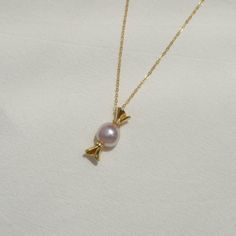 Our Sweet Treat necklace features a candy charm made with freshwater pink lavender pearls. Satisfy your cravings while looking stylish. (Don't worry, they're not just for kids!) Details - 9-10mm pink lavender baroque pearls. - Each baroque pearl is unique and different, we carefully select the baroque pearls but shapes and pearl sizes may vary. - 14k gold filled chain, gold vermeil candy charm. Wanna browse more of my necklace series? https://www.etsy.com/ca/shop/PrettyPearlfect?section_id=31790 Pink Pearl Charm Pendant Necklaces, Pink Pendant Necklaces With Pearl Charm, Pink Pearl Pendant Necklace For Gift, Elegant Pearl Charm Necklace For Birthday, Elegant Pink Round Charm Necklace, Elegant Pink Round Charm Necklaces, Sweet Silver Necklace Perfect For Gifts, Pink Necklaces With Pearl Charm For Gifts, Pink Necklaces With Pearl Charm As Gift