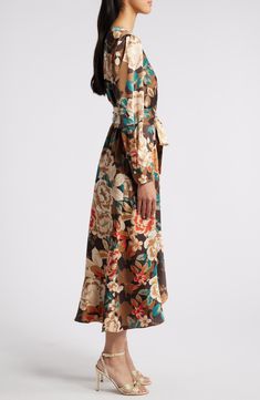 An autumnal floral pattern lends personality to a faux-wrap dress designed with graceful cascading ruffles. 49 1/2" length Hidden back zip with hook-and-eye closure Surplice V-neck Long sleeves Removable tie belt Lined 97% polyester, 3% spandex Dry clean Imported Cascading Ruffles, Wrap Midi Dress, Faux Wrap Dress, Nordstrom Dresses, Tie Belt, Ruffles, Designer Dresses, Wrap Dress, Floral Pattern