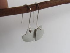 "These earrings are perfect for Valentine's day or any or any gift occasion. I cut the hearts out of sterling silver sheet with my little saw and gave them a soft brushed surface. The ear wires are handmade of sterling silver with a little ball at the end which shows at the front of the heart. Simple, elegant, and sweet. The hearts measure approx. 5/8\" by 5/8\" (16mm by 16mm)" Sterling Silver Earrings For Anniversary, Sterling Silver Earrings For Mother's Day Anniversary, Sterling Silver Earrings For Anniversary And Mother's Day, Sterling Silver Earrings For Anniversary Gift, Minimalist Sterling Silver Earrings For Mother's Day, Silver Sterling Silver Earrings For Anniversary Gift, Silver Heart Earrings For Anniversary Gift, Silver Heart Earrings For Anniversary, Silver Heart Shaped Earrings For Anniversary