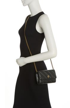 Quilted leather brings a chic style to this wallet with a chain shoulder strap. Flap closure Leather Imported Elegant Everyday Wallet On Chain With Chain Strap, Leather Evening Wallets With Chain Strap, Chic Leather Wallet With Chain Strap, Chic Leather Wallets With Chain Strap, Black Evening Wallet With Chain Strap, Black Evening Wallets With Chain Strap, Everyday Leather Wallets With Chain Strap, Classic Crossbody Wallet With Chain Strap, Leather Wallets With Chain Strap For Everyday