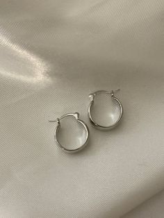 16k white gold filled Chrome Hoops Silver Tarnish-resistant Huggie Hoop Earrings, Silver Tarnish Resistant Huggie Hoop Earrings, Trendy Silver Hypoallergenic Huggie Earrings, Trendy Hypoallergenic Silver Huggie Earrings, Minimalist Rounded Earrings For Gift, Minimalist Rounded Earrings For Gifts, White Huggie Earrings For Everyday, Everyday White Gold Rounded Jewelry, Silver Hypoallergenic Huggie Hoop Earrings