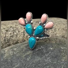 Signed Navajo Sterling Silver Turquoise Pink Conch Shell Multi Stone Cactus Ring 7.25 Orders Totaling $100 And Up Include An Anti-Tarnish Treated Velvet Jewelry Pouch! Ring Is A Size 7.25 Face Of Ring Measures Approximately 1.25" X 1.5" Weighs Approximately 10 Grams Condition: New!!! Metal: Sterling Silver See Photos For Hallmark Comes In A Gift Box Pink Turquoise Jewelry, Bohemian Teardrop Turquoise Ring, Handmade Pink Southwestern Jewelry, Western Engagement Rings Turquoise, Vintage Navajo Jewelry, Stone Cactus, Cactus Ring, Vintage Turquoise Jewelry, Rodeo Jewelry