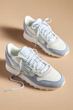 Leather upper Textile insole Rubber sole Tie styling Imported | Classic Leather Sneakers by Reebok in Blue, Women's, Size: 5, Leather/Rubber at Anthropologie Reebok Shoes For Women, Reebok Women Sneakers, Nike Womens Sneakers, Fun Sneakers For Women, Aesthetic Shoes For Women, Reebok Shoes Aesthetic, Classic Sneakers Women, Blue Sneakers Women Outfit, Women’s Sneakers