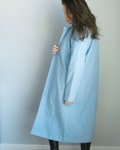 For Feyre's first outing in Velaris, she describes her outfit in detail, and included in the mix is a "knee-length, sky blue overcoat". This particular coat is a little longer, but it fits the bill, I think! Fits true to size -- I am wearing a medium in these photos. Open front (no closures/clasps) Measurements SMALL 42" long, 15" across shoulders MEDIUM 43" long 16" across shoulders LARGE 44" long 17" across shoulders Coat is made from 100% polyester Blue Long Cotton Outerwear, Long Blue Cotton Outerwear, Light Blue Oversized Cotton Outerwear, Oversized Light Blue Cotton Outerwear, Oversized Long Blue Outerwear, Oversized Light Blue Long Sleeve Outerwear, Light Blue Oversized Long Sleeve Outerwear, Blue Winter Outerwear For Daywear, Light Blue Cotton Outerwear For Spring