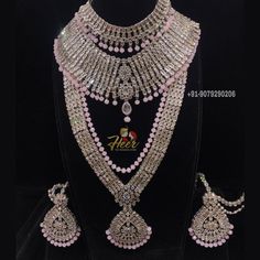 This bridal set is made up with rodium silver polish and gives up an excellent royal look. It comes with Choker, necklace, long haar, earrings, mathapati, Hath Panja, passa. For more designs or any query. Contact us : +91-9079290206 Festive Silver American Diamond Jewelry Sets, Silver Kundan Necklace For Wedding With Elegant Design, Silver Kundan Necklace For Marriage In Temple Jewelry Style, Silver Meenakari Jewelry For Marriage, Silver Kundan Necklace For Reception With Elegant Design, Traditional Silver Jewelry Sets For Marriage, Elegant Bridal Accessories With Stone Work In Silver, Elegant Silver Bridal Accessories With Stone Work, Elegant Silver Lehenga With Tilla