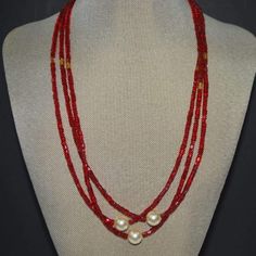 Multi Strands Red Beads With Pearl Ascent Elegant Necklace - FashionByTeresa Red Double Strand Faceted Beaded Necklaces, Red Double Strand Faceted Beaded Necklace, Red Double Strand Beaded Necklace With Faceted Beads, Multi-strand Red Coral Beaded Necklace As Gift, Multi-strand Red Coral Beaded Necklace For Gift, Red Double Strand Beaded Necklaces, Red Double Strand Beaded Necklace With Polished Beads, Red Double Strand Jewelry With Faceted Beads, Red Multi-strand Beads For Gift