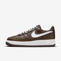 A scorching edition to your AF1 collection, this head-turning take on the hoops-to-street icon brings the heat. Contrasting colors add a bold look to any 'fit, while Nike Air cushioning puts the cherry on the bottom. Brown Nike Air Force, Brown Nike Air, Tom Ford Eyewear, Nike Air Force 1 Low, Retro Men, Retro Shoes, Nike Acg, Clarks Originals, Air Force 1 Low