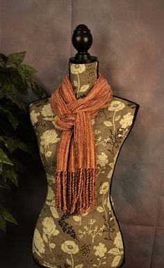 "This is a very soft handwoven rayon chenille scarf. It measures 68\" by 8\", long enough to wear many different ways. The fringe is twisted at either end, making it hand washable. It is a really nice combination of rose shades, tan and a little brown, with a striped effect. It would make a perfect gift for someone special or for yourself. Rayon chenille may be washed as long as the fringe is twisted. Please gently hand wash, roll wet scarf in a towel until it's just a little damp and put in dry Chenille Scarf, The Fringe, Scarf Wrap, Scarf Accessory, Really Cool Stuff, Hand Weaving, Hand Wash, Twist, Heat