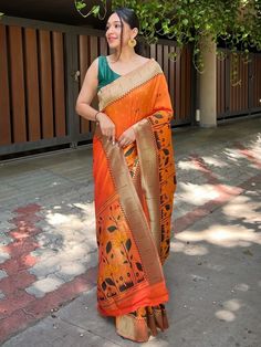 Discover exquisite craftsmanship with our orange banarasi paithani silk saree and matching saree blouse. Made from pure silk, this saree showcases the mastery of traditional Indian weaving techniques, resulting in a stunning and elegant design.
The highlight of this saree is the beautifully woven resham zari, which adds a touch of opulence and grandeur. The intricate 12-inch meenakari flower design at the border is a testament to the skill and artistry of our talented artisans.With a length of 5 Traditional Orange Art Silk Pre-draped Saree, Traditional Orange Pre-draped Saree For Festive Occasions, Traditional Orange Banarasi Silk Pre-draped Saree, Traditional Orange Pre-draped Saree With Zari Weaving, Festive Orange Pre-draped Saree With Zari Weaving, Orange Banarasi Silk Pre-draped Saree For Diwali, Orange Blouse Piece For Puja During Navratri, Orange Handloom Pre-draped Saree For Puja, Orange Chanderi Pre-draped Saree For Navratri