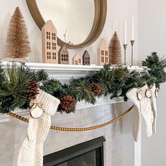 a mantle with stockings and pine cones on it