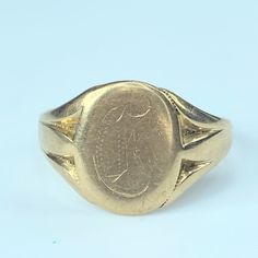 A Fine Men's Signet Ring, Circa 1950's. Oval Center With Letter "D" Monogram. Double Groove On Shanks. Ring Top Is 15.58mm. Ring Size 13.5 , Weight 5.8g, Assay 10k Classic Yellow Gold Signet Ring With Maker's Mark, Gold Round Signet Ring With Maker's Mark, Gold Signet Ring With Maker's Mark, Vintage Yellow Gold Signet Ring With Hallmarks, Formal Engraved Ring With Maker's Mark, Classic Yellow Gold Engraved Ring With Maker's Mark, Classic Engraved Yellow Gold Ring With Maker's Mark, Vintage Yellow Gold Signet Ring With Polished Finish, Collectible 14k Yellow Gold Signet Ring