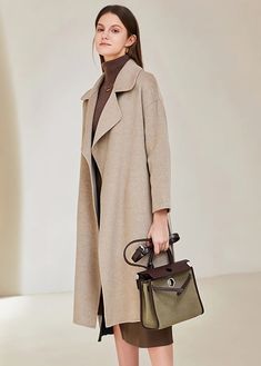 Keep your outfit looking chic and cozy with this belted, thigh-length wool coat for women. Completely crafted from 100% wool, this timeless classic will have you looking smart and feeling warm no matter where you go. Long sleeves Notched lapels Side-seam pockets Detachable belt 100% wool Dry clean Women's coat/jacket Item #3103110 Size info XS=US2=UK6=EU32 S=US4-6=UK8-10=EU34-36 M=US8-10=UK12-14=EU38-40 ★★ It would be helpful if you provided your height and weight so that I could assist you in c Chic Wool Coat With Belted Cuffs And Notch Lapel, Elegant Wool Coat With Belted Cuffs And Lapel Collar, Classic Beige Wool Coat With Belted Cuffs, Chic Wool Coat With Belted Cuffs And Lapel Collar, Chic Wool Coat With Belted Cuffs For Office, Long Wool Coat With Belted Cuffs For Work, Classic Wool Coat With Belted Cuffs For Office, Belted Wool Pea Coat, Belted Long Wool Pea Coat