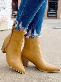 Whether you're headed to the office or out for a date night, you'll love wearing our Cindy Camel Booties! Showcasing a pointed front with solid finish, you'll be on-trend in these booties! They even have a soft lining and comfy cushioned insole to keep your feet happy as you take on the day. You'll keep comfy and step with confidence on the 3-inch block heel, along with the convenience of a side zipper closure that offers easy on and off. Bootie, The Office, Side Zipper, Block Heels, Date Night, Camel, The Day, Confidence, Zipper