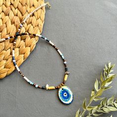 🌟 Designed for those who like to be original and looking for unique jewelry  ✅ Each piece is hand-shaped and drawn by us, making it wonderfully unique--so, expect a bit of delightful variation from the pictures 🍀 Because of their handmade charm, every ceramic piece is entirely one-of-a-kind. These high-quality creations are made to last, just like the memories you'll create with them!  🎁 It is suitable for every day , it can also be purchased as a perfect gift for special days like Valentine's Day, Mother's Day, Christmas or Birthday gift 🧿 Turkish evil eye  The evil eye symbolizes protection from bad energy and envy in Turkish and Middle Eastern culture The evil eye bead is believed to bring good vibes and good luck, we hope it will give you the same feeling! 📦 Packing :  All necklac Artistic Colorful Beaded Necklaces As Gift, Artistic Colorful Beaded Necklaces For Gifts, Artistic Colorful Beaded Necklace For Gift, Handmade Artistic Beaded Necklaces, Artistic Handmade Beaded Necklaces With Round Beads, Handmade Artistic Jewelry With Round Beads, Artistic Handmade Jewelry With Round Beads, Artistic Handmade Round Bead Jewelry, One Of A Kind Artsy Pendant Jewelry