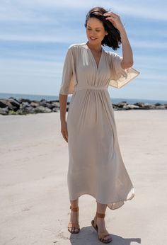 V-neck Maxi Dress With Elastic Sleeves For Daywear, Summer Wrap Dresses With Draped Sleeves, Modest Ruched Maxi Dress, Modest Maxi Dress With Elastic Sleeves, Summer Wrap Dress With Draped Sleeves, Versatile Summer Dresses, Modest Ruched Midi Dress For Summer, Versatile Flowy Summer Dress, Flowy Wrap Maxi Dress For Brunch