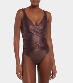 Basics ruched swimsuit in brown - Karla Colletto | Mytheresa Fitted V-neck Swimwear With Twist Front, Fitted V-neck Polyamide Swimwear, Elegant V-neck Swimwear For Pool, Fitted V-neck Swimwear In Polyamide, Underwire Ruched Tankini For Swimming, Elegant V-neck Swimwear For Sunbathing, Elegant V-neck Tankini With Lined Body, Fitted Ruched Swimwear For Sunbathing, V-neck Twist Front Swimwear For Poolside