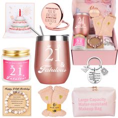 a pink gift box filled with personalized items including a wine glass and keychain