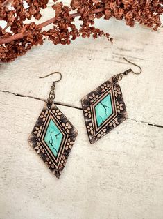 Handmade from solid cowhide leather, these earrings are hand-tooled to resemble Turquoise stone! Slowly handmade without a pattern, these are unique and one of a kind designs. The leather is cut, tooled, dyed, painted, distressed and antiqued all by hand in a process that produces one of a kind jewelry! You will get the exact earrings in the photo. Ready to ship, with fast and free shipping. Handmade with lots of love in my mountain studio! Please see my other offerings at theLeatherKnot.etsy.co Hand Tooled Leather Earrings, Tooled Leather Earrings, Cowboy Candy, Handmade Leather Work, Custom Leather Work, Leather Jewelry Making, Diy Leather Earrings, Leather Jewelry Diy, Leather Earring