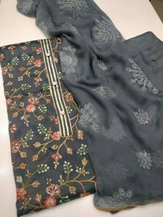 Item Overview ATHARVA Embroidery Salwar Kameez/Embroidery Jaal Black Grey w/Embroidered Dupatta/Thread Work Custom Stitch/Tunic Pant/Patiala Salwar/ Dno. CH1479 Fabric:  * Shirt Chanderi Silk - Embroidered Neck- Black Grey  - 2.5 Mts Beautiful Hand Embroidere Jaal * Dupatta: Chiffon ChinnonDupatta- 2.5 Mts- Thread work Latkans Tassels- (Motifs may wary) * Bottom Santoon Silk 2.5 Mts. Excusive Hand Embroidered Party Wear Punjabi Suit. Customization: * Fabrics Customization: Designs Can be made in Traditional Drape Dola Silk Kurta With Floral Embroidery, Floral Embroidered Mulmul Kurta With Traditional Drape, Anarkali Churidar With Floral Embroidery For Transitional Season, Festive Dola Silk Kurta With Floral Embroidery, Designer Floral Embroidered Dola Silk Kurta, Mulmul Kurta With Floral Embroidery And Traditional Drape, Straight Jamawar Kurta With Floral Embroidery, Diwali Dola Silk Kurta With Floral Embroidery, Floral Embroidered Mulmul Anarkali Set With Straight Kurta