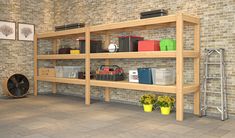 a room with some shelves and plants on the floor in front of a brick wall