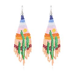 PRICES MAY VARY. 🌈Bohemian Beaded Dangle Earrings: Long beaded statement tassel earrings with cactus pattern, nature seed bead earrings add ease, freedom and enthusiasm to your look. 🌈Size of Tassel Drop Earrings: Long beaded fringe earrings are made of high quality seed beads, each bead is carefully selected and threaded, mini statement bohemian earrings length: 4.7 inch, width: 1.5 inch. 🌈Various Colors to Match Your Clothes: Handmade beaded tassel earrings are compatible with everything in Summer Chandelier Earrings With Dangling Beads, Beaded Tassel Earrings For Beach, Summer Chandelier Dangle Earrings With Dangling Beads, Summer Beach Tassel Earrings With Dangling Beads, Summer Chandelier Dangle Earrings With Beads, Summer Chandelier Dangling Bead Earrings, Summer Bohemian Dangle Tassel Earrings, Bohemian Summer Dangle Tassel Earrings, Summer Beach Jewelry With Beaded Fringe