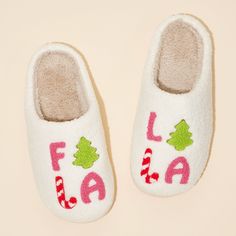 Step into ultimate coziness with our ‘FALALALA’ Tree Fuzzy Home Slippers. The plush, fuzzy material will keep your feet warm and comfortable, making them perfect for lazy days at home. Small: 38-39 (6-7) Medium: 40-41 (8-9) Large: 42-43 (10-11) Bbq Crafts, Peach Drinks, Warm Apple Cider, Christmas Slippers, Candle Bar, Holiday Scents, Home Slippers, Fuzzy Slippers, Holiday Candy