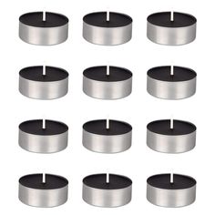 twelve candles are arranged in rows on a white background