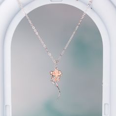 This exquisite rose pendant necklace showcases a 3D rose in 925 sterling silver with rose gold plating for a stunning flower color. It hangs delicately on a 925 sterling silver cable pendant with an adjustable ball. Make this elegant rose pendant necklace a part of your everyday fine jewelry collection, or gift it to a loved one for a special occasion. Materials: 925 sterling silverFinish: platinum plate, rose gold plateMaximum length is 17.5 inches, can be adjusted shorter using the adjustable ball. Jewelry Care: See more information about how to care for your jewelry here. Shipping Policy: Orders will be shipped within 1-3 business days. Economy shipping will take 7-14 days to arrive and standard shipping is 1- 4 days for U.S. orders. International shipping time is depended on the countr Rose Gold Pendant Flower Necklace With Clavicle Chain, Rose Gold Flower Pendant Necklace With Clavicle Chain, Rose Gold Clavicle Chain Necklace With Flower Pendant, Rose Gold Clavicle Chain Flower Pendant Necklace, Rose Gold Flower Pendant Clavicle Necklace, Rose Gold Flower Charm Pendant Necklace, Rose Gold Pendant Flower Necklace, Rose Gold Flower Necklace With Round Pendant, Rose Gold Flower Necklace Gift For Her