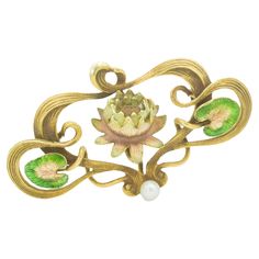 This 10 karat yellow gold brooch pin from the Art Nouveau era, features a stylized floral design that is characteristic of the period - spanned roughly from 1890 to 1910. Art Nouveau was a reaction against the academic art, industrialization, and Victorian rigidity of the 19th century. It embraced dynamic, flowing lines and often incorporated forms from nature, such as plants, flowers. The brooch is adorned with pastel-colored enamel, executed in the guilloché technique—a decorative pattern engraved on a metal surface, over which translucent enamel is applied. This allows for a subtle interplay of light and depth, enhancing the piece's visual appeal and giving it a unique, iridescent quality. The use of pastel colors is indeed a hallmark of the era, seeking to evoke the softness and subtle Lalique Jewelry, Bijoux Art Nouveau, Antique Pins, Art Nouveau Jewelry, Pin Pendant, Enamel Flower, Gold Art, Flower Pins, Vintage Jewels