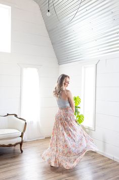 Look no further, our best-selling maxi skirt is here in a fresh new print! The stunning bright floral print, flattering button detail, and a flowy maxi-length is sure to make this your go-to for any summer get-together! Whether you’re heading out on a flirty date night or a daytime gathering, the only thing you’ll be worried about is having too much fun! Features: smocked elastic waist, functional buttons, lined to knee, floral print, open in front, long length Color: Blush Mix100% RayonFor full care instructions, please refer to the manufacturer's label. Fit: True to size.Length: Hits at the ankle on most -- 42” in total lengthWaist: Stretchy with elastic waistbandHips: Relaxed with give Models are wearing size Medium and Small respectively. MODEL INFO Ashley Brook Height: 5'3" Height: 5' Play Date, Floral Maxi Skirt, Color Blush, New Print, Floral Maxi, Button Detail, Long Length, Smocking, Date Night