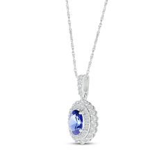 Sure to please, the dainty look of this tasteful pendant is a meaningful anytime gift. Crafted in sterling silver An oval-cut blue lab-created sapphire gleams at the center Two rows of round-cut white lab-created sapphires create a scallop-edged halo around the centerpiece More white lab-created sapphires shimmer along the bail The 18-inch rope chain secures with a spring ring clasp Classic Blue Round Pendant Necklace, Blue Oval Pendant Necklace For Anniversary, Blue Birthstone Necklace With Oval Pendant, Blue Oval Pendant Necklace With Birthstone, Blue Oval Birthstone Necklaces, Blue Oval Birthstone Necklace, Halo Necklace, White Lab, Double Halo