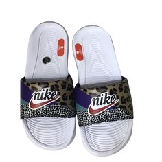 - Brand New - Women's Size 6 Nike Victori One Slides Sandals Cn9676-104 In Women's Size 6 Are A New, Unworn Pair Of Shoes Without A Box. These Sandals Feature A White And Black Animal Print Pattern With Accents Of Electro Purple And Habanero Red. The Slide Closure Makes Them Easy To Put On And Take Off. The Flat Heel Style And Rubber Upper Material Make Them Lightweight And Comfortable To Wear. These Nike Benassi Sandals Are Perfect For Any Casual Occasion. Nike Sandals Women, Nike Victori One Slides, Nike Sandals, Nike Benassi, White Flip Flops, Animal Print Pattern, Comfort Shoes Women, Footbed Sandals, Slides Sandals