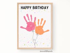 a birthday card with two handprints on it and the words, happy birthday