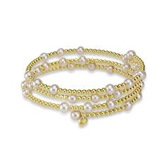 Introducing the Pearl Beaded Flex Bangle in 18K Yellow Gold - an elegant accessory that adds a pinch of sophistication and sparkle to your wardrobe. This extraordinary bangle, a new arrival, combines the shimmering allure of lustrous pearls and the eternal grace of 18K yellow gold. Each pearl bead is intricately woven into a flexible gold setting, creating a seamless and smooth look. This eye-catching birthstone bracelet can add a unique charm when worn alone or can create a fashionable impact w Luxury Beaded Pearl Bracelet, Luxury Beaded Yellow Gold Bracelets, Elegant Polished Beads Bracelet For Party, Luxury Beaded Bangle Bracelets, Polished Beads Bracelet For Wedding, Elegant Gold Bead Bangle Bracelets, Elegant Stackable Pearl Bracelet For Wedding, Elegant White Bracelet With Gold Beads, Elegant Gold Beaded Bangle Bracelet