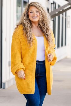 We are so in love with this fabulous cardi! It is the perfect way to add a bold touch to your wardrobe! Crafted from a soft fabric in a vibrant mustard hue, this layering piece pairs effortlessly with a range of looks - from dressed up with a dress and boots to relaxed with a solid top and skinnies! 50% Cotton, 50% Acr Dress And Boots, So In Love, Model Fits, Solid Tops, Layering Pieces, A Dress, Dress Clothes For Women, Soft Fabric, Soft Fabrics