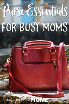 a red purse sitting on top of a stone slab with the words pure essentials for busy moms