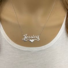 Description: 925 Sterling Silver Name Plate Heart Necklace - Jessica Item No.: C01 Metal Type: .925 Sterling Silver With Stamped 925 Finish: High Polish Measurement: 16" - 18 Inches. Pendant: 1.5" X 0.75" Brand New With Box Silver Name Jewelry - Gift For Mom, Silver Name Jewelry As Gift For Mom, Personalized Silver Jewelry As A Gift For Mom, Personalized Silver Fine Jewelry Gift, Silver Fine Jewelry For Personalized Gift, Fine Silver Jewelry For Personalized Gift, Personalized Heart Necklace In Sterling Silver, Sterling Silver Fine Jewelry For Personalized Gifts, Classic Sterling Silver Jewelry For Valentine's Day