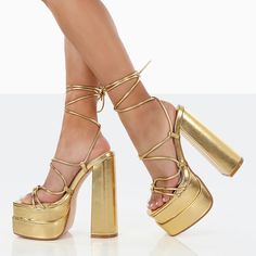 Step into style with these Women's Gold Square Toe Strappy Platform Sandals. Featuring chunky heels for comfort and a trendy open square-toe design, these sandals effortlessly elevate your fashion game. Color: Gold Heel Type: Chunky heel Heel Height: 5.9" / 150 mm approx Product measurements were taken using size 8. Please note that measurements may vary by size. Toe: Open square toe With platform Sexy lace-up design Handcrafted US sizing. Fits true to size. Gold Block Heels With Sculpted Heel For Summer, Summer Gold Block Heels With Sculpted Heel, Trendy Gold Block Heel Shoes, Gold Sandals With Block Heel, Gold Synthetic High Heel Block Heels, Modern Gold Block Heel Shoes, Modern Gold Square Toe Heels, Modern Gold Square-toe Heels, Gold High Heel Block Heels With Platform