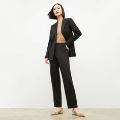 The straight-leg version of our popular Horton pant , the Smith is elongating and impeccably tailored—but with an extra-streamlined silhouette. Try this machine-washable suiting trouser with the matching Kati jacket or Yiyan blazer , or go Power Casual with a polished T-shirt . Want to complete the suit? Shop all mix and match pieces in this fabric . Note: There was a mix-up at our factory, and a few pairs of Smith pants include a tag mentioning that the hems are adjustable. Please disregard thi Fall Workwear Suits With Straight Leg, Tailored Straight Pants For Work, Elegant Tailored Straight Bottoms, Elegant Straight Bottoms For Business Casual, Chic Tailored Straight Bottoms, Modern Business Casual Pantsuit With Pressed Crease, Tailored Straight Pants For Office, Tailored Straight Office Pants, Chic Tailored Straight Dress Pants