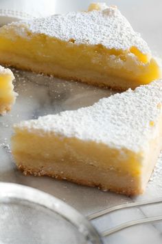 A delicious recipe from Ina Garten is this Lemon Bars, made with unsalted butter, granulated sugar, all-purpose flour, kosher salt, and fresh lemons. This Lemon Bar Crust Recipe, Best Ever Lemon Bars Recipe, Lemon Bar Butter Cookies, Lemon Bars With Olive Oil And Sea Salt, Limoncello Ricotta Cheesecake Ina Garten, Valerie Bertinelli Lemon Bars, Lemon Meringue Squares, Recipes With Lemon Extract, Recipe With Lemons